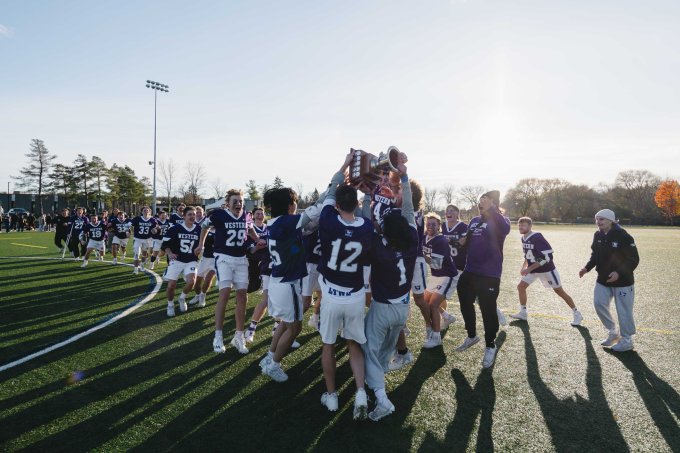 Western celebrating with the Baggataway Cup. (Photo: Trent Athletics)